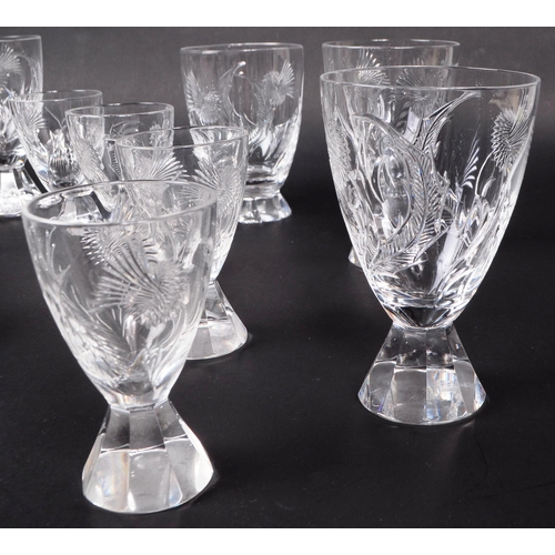 157 - Collection of mid century cut glass thistle flower design on faceted flared foot. Having eleven smal... 