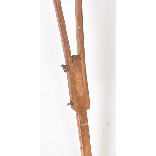 283 - An early 20th-century vintage Bristol, Cossham Memorial Hospital crutch. It features a leather armpi... 