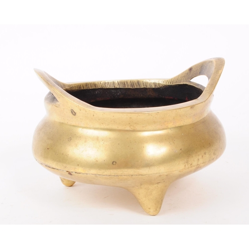 350 - A 19th century Chinese brass open censer incense burner with raised loop handles tripod base with im... 