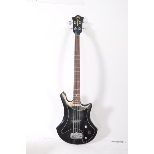 450A - Guild - A vintage late 1970s B-301 solid body bass guitar, with a mahogany body and neck, with a bla... 