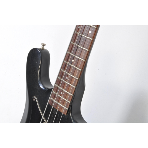 450A - Guild - A vintage late 1970s B-301 solid body bass guitar, with a mahogany body and neck, with a bla... 