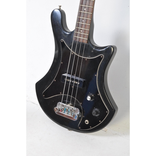 450A - Guild - A vintage late 1970s B-301 solid body bass guitar, with a mahogany body and neck, with a bla... 