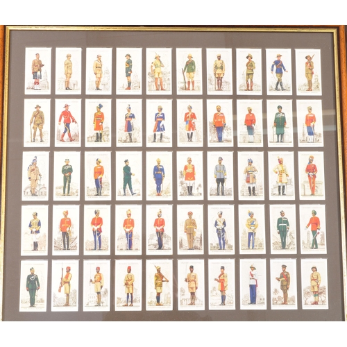 477 - A large collection of framed and glazed vintage 20th century cigarette cards to include cars,people,... 