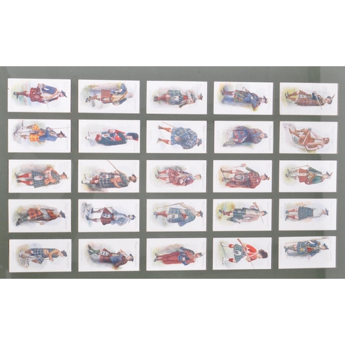 477 - A large collection of framed and glazed vintage 20th century cigarette cards to include cars,people,... 