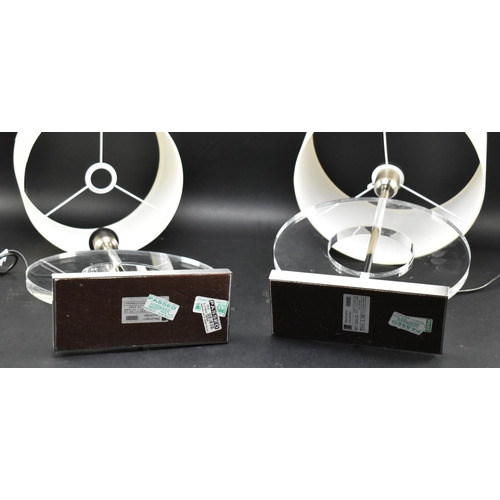 102 - Baulmann Leuchten - a pair of vintage modernist high end designer acrylic and chrome ring shaped bed... 