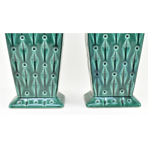 113 - Eastgate - a pair of early 20th century Art Deco green ceramic vases. Each vase of tapering form wit... 