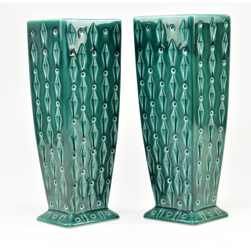 113 - Eastgate - a pair of early 20th century Art Deco green ceramic vases. Each vase of tapering form wit... 