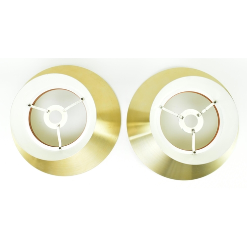 114 - Carl Thore - a pair of mid century Danish designer hanging ceiling lights. Each of UFO form having w... 