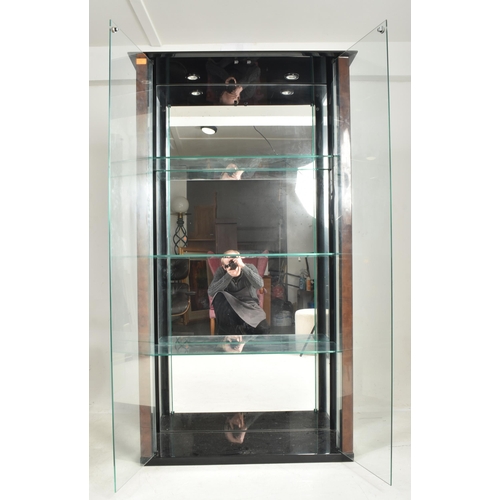 115 - Paul Michel - a retro 1970s French designer display cabinet. The cabinet having a glass case with a ... 