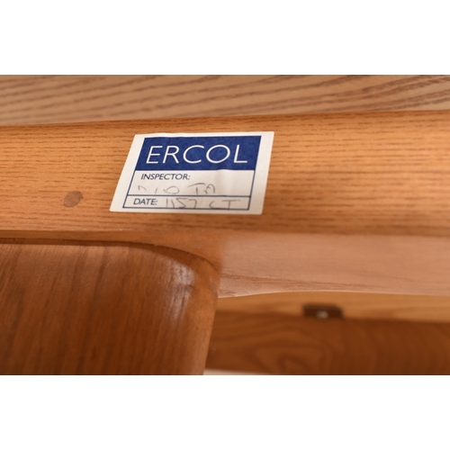 116 - Ercol Furniture - Windsor Rage - a beech & elm extending dining table. The table hving a curved ... 