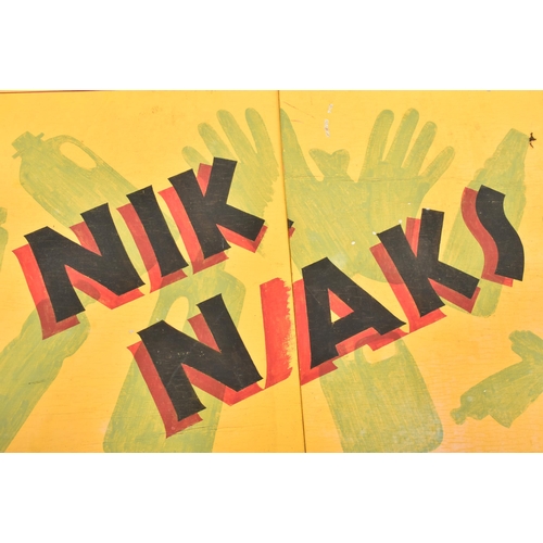 123 - Nik Naks - a vintage fairground / funfair hand painted shop sign. The two part sign having red and b... 