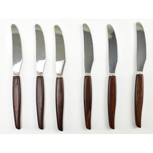 132 - A vintage mid century circa 1970s Danish style teak cutlery canteen. The cased set with thirty-two p... 