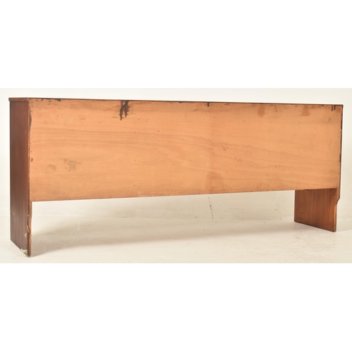 154 - Richard Young for Merrow Furniture - a vintage 20th century teak veneered sideboard. The sideboard f... 