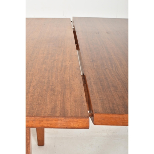 158 - Gordon Russell of Broadway is a large retro mid-20th-century teak wood extending dining table. The t... 