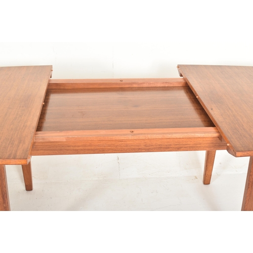 158 - Gordon Russell of Broadway is a large retro mid-20th-century teak wood extending dining table. The t... 