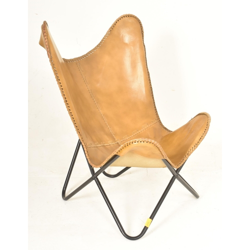 160 - After Jorge Ferrari-Hardoy - a contemporary brown leather & metal Butterfly chair with foot stoo... 