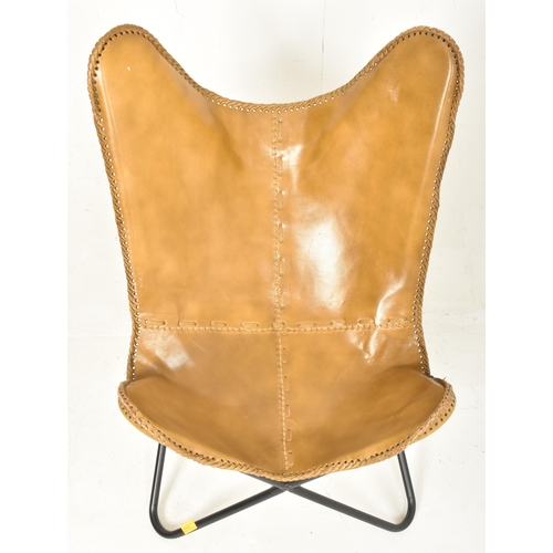 160 - After Jorge Ferrari-Hardoy - a contemporary brown leather & metal Butterfly chair with foot stoo... 