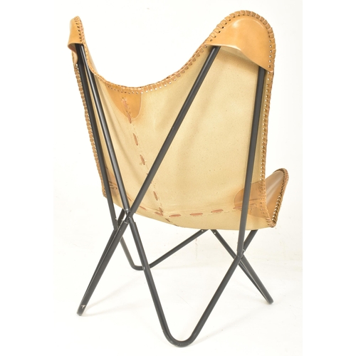 160 - After Jorge Ferrari-Hardoy - a contemporary brown leather & metal Butterfly chair with foot stoo... 