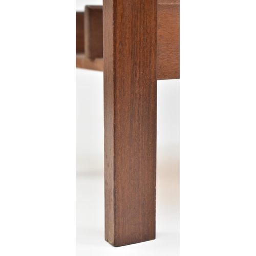 162 - Guy Rogers - a retro 1960s teak wood magazine rack stand. The magazine rack of square form with sect... 