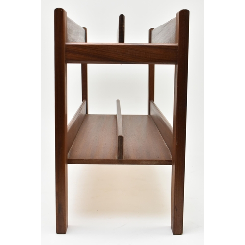 162 - Guy Rogers - a retro 1960s teak wood magazine rack stand. The magazine rack of square form with sect... 