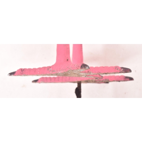 163 - A retro 1970s cast aluminium painted garden display flamingo. The flamingo hand painted in pink, rai... 