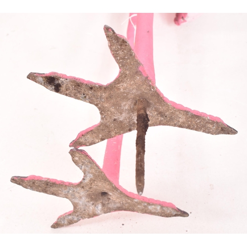 163 - A retro 1970s cast aluminium painted garden display flamingo. The flamingo hand painted in pink, rai... 