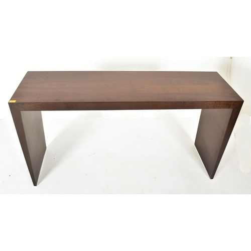 167 - Contemporary high-end designer walnut console table. The table of slender rectangular form having a ... 