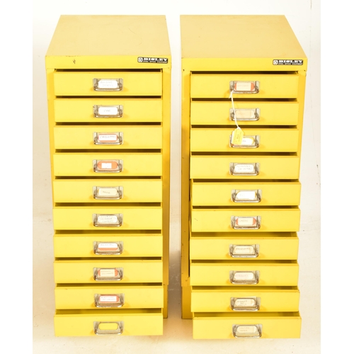 174 - Bisley - a vintage mid century pair of industrial office filing cabinets in mustard yellow. Each cab... 