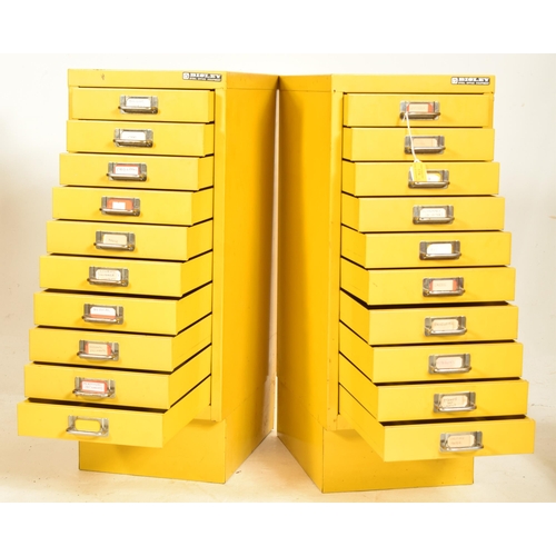 174 - Bisley - a vintage mid century pair of industrial office filing cabinets in mustard yellow. Each cab... 