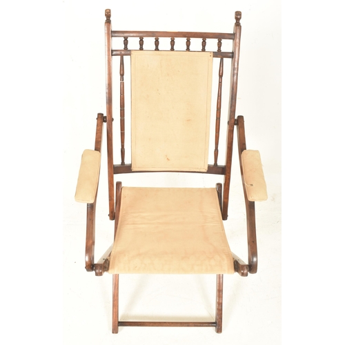 201 - A Victorian 19th century mahogany & cream fabric upholstery campaign / steamer folding chair. The ch... 