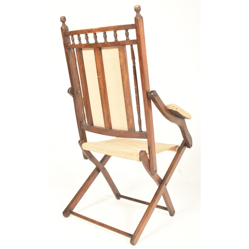 201 - A Victorian 19th century mahogany & cream fabric upholstery campaign / steamer folding chair. The ch... 