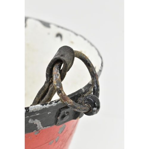 206 - An early 20th century black & red painted metal fire bucket. The bucket with leather adjustable hand... 