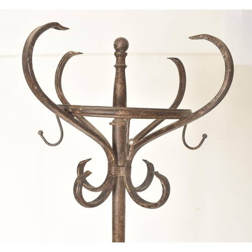 207 - A large Thonet Revival cast metal hat / coat floor stand. The stand having four large scrolled hooks... 