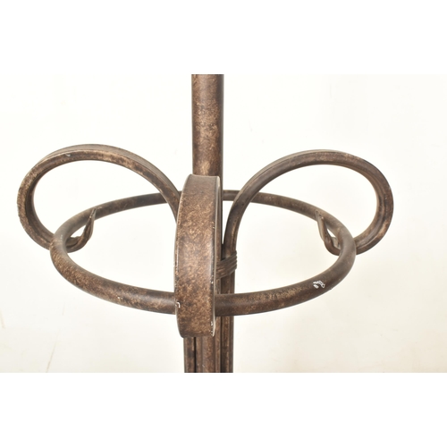 207 - A large Thonet Revival cast metal hat / coat floor stand. The stand having four large scrolled hooks... 