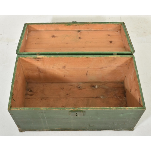 218 - An early 20th century green painted wooden dome top travel trunk chest. The trunk having a dome top ... 