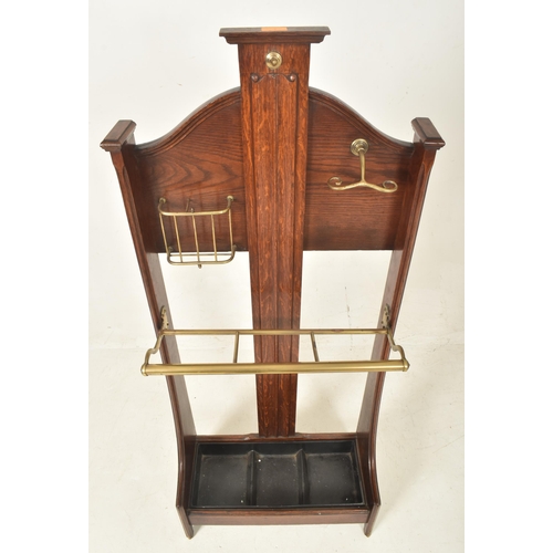 220 - A High Victorian late 19th century oak & brass gentleman's vanity hall stick stand. The stand having... 