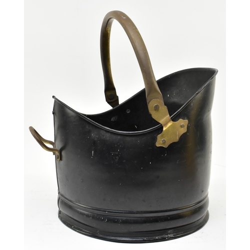 221 - A 19th century inspired black painted metal & brass coal scuttle bucket. The scuttle having a loop b... 