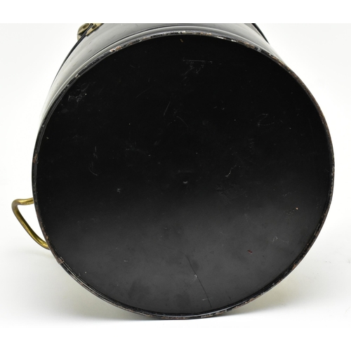 221 - A 19th century inspired black painted metal & brass coal scuttle bucket. The scuttle having a loop b... 