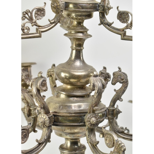 225 - A large pair of French Empire electroplated / silver-plated seven arm candelabras. Each candelabra h... 