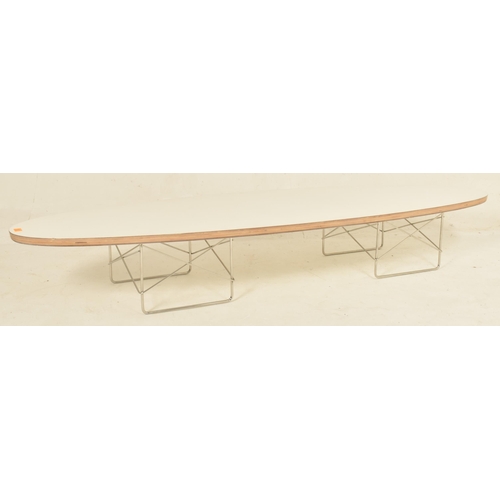 229 - In the manner of Charles and Ray Eames x Herman Miller - a contemporary ' surfboard ' elliptical sha... 