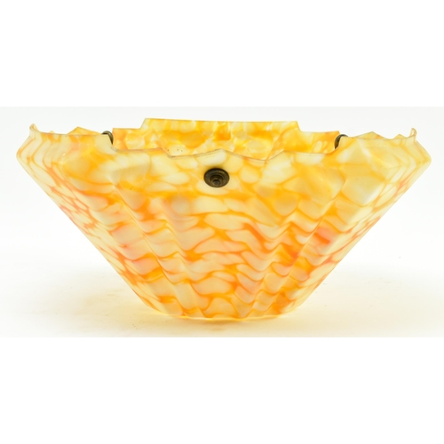 23 - An early 20th century circa 1930s Art Deco mottled orange frosted glass pendant light shade. The sha... 