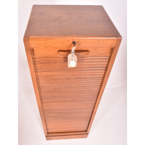 235 - A vintage mid century French oak tambour fronted filing cabinet with original key. The cabinet frees... 