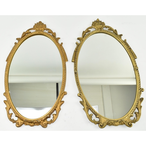 239 - Cast Craft - a matching pair of mid century gilt metal framed mirrors. Each having acanthus pierced ... 