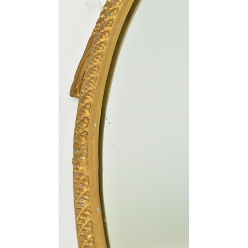 239 - Cast Craft - a matching pair of mid century gilt metal framed mirrors. Each having acanthus pierced ... 