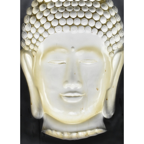 241 - A contemporary high end design moulded resin wall hanging artwork with in relief head of Buddha to c... 