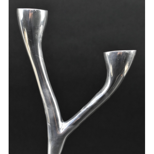 242 - Georg Jensen (attributed to) - a vintage late 20th century three arm chrome candlestick. The candle ... 