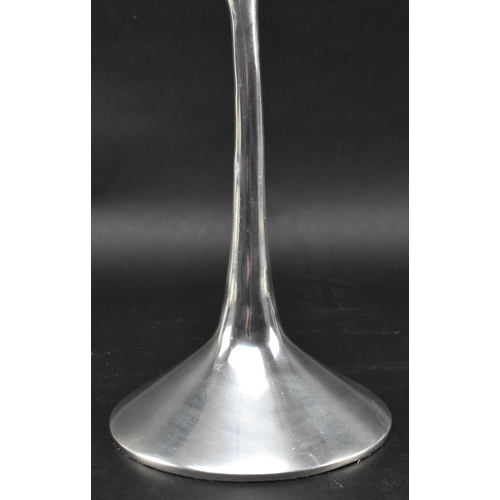 242 - Georg Jensen (attributed to) - a vintage late 20th century three arm chrome candlestick. The candle ... 