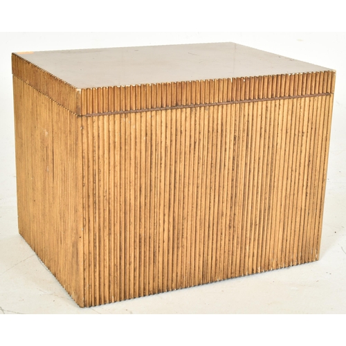 248 - A contemporary Hollywood Regency gilt and reeded blanket / storage box. The box of square form havin... 