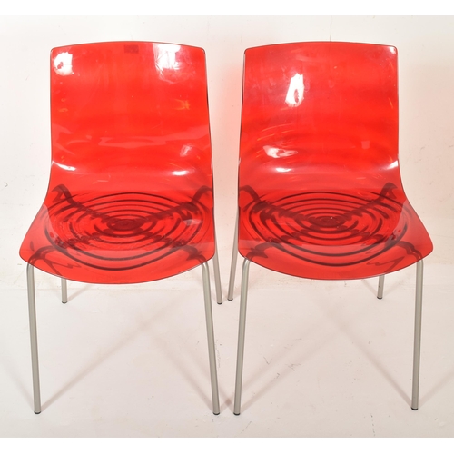 249 - Calligaris - L'Eau Stacking Chairs - a pair of contemporary Italian designer dining chairs. Each cha... 