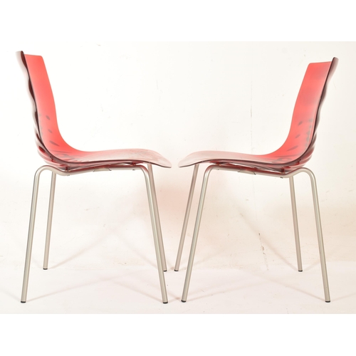 249 - Calligaris - L'Eau Stacking Chairs - a pair of contemporary Italian designer dining chairs. Each cha... 